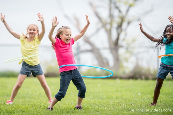 girls playing hula hoops