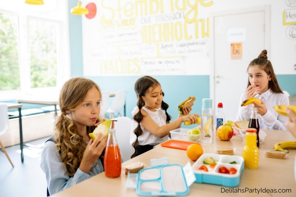young girls having lunch at school