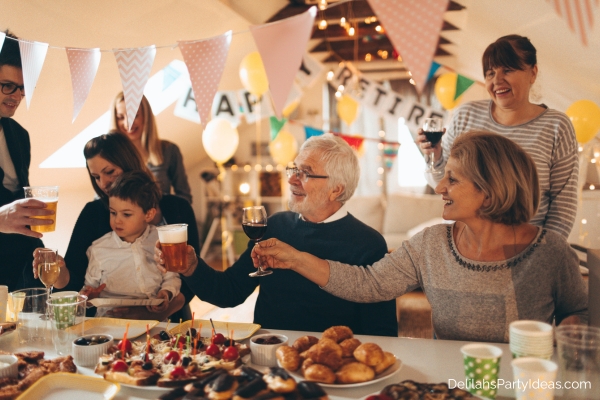 senior man at his retirement party with family