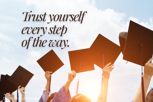graduates holding up their caps with quote overlay