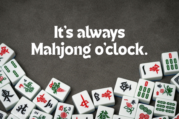 mahjong tiles on black background with saying overlay