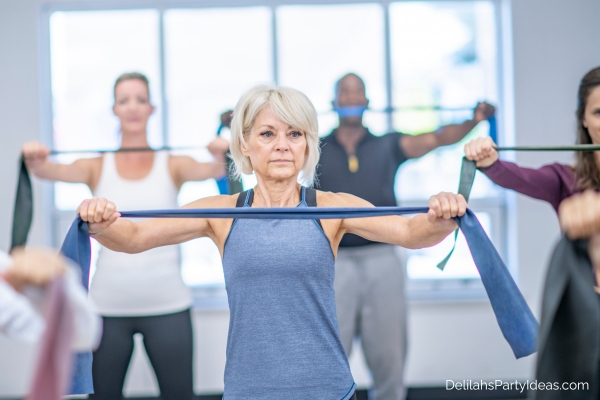 senior woman working out in a fitness class