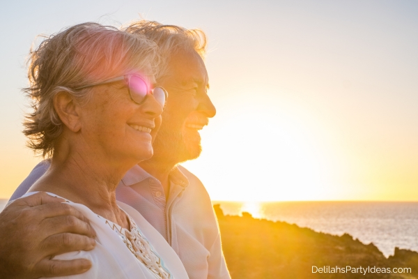 senior couple watching a beautiful sunset